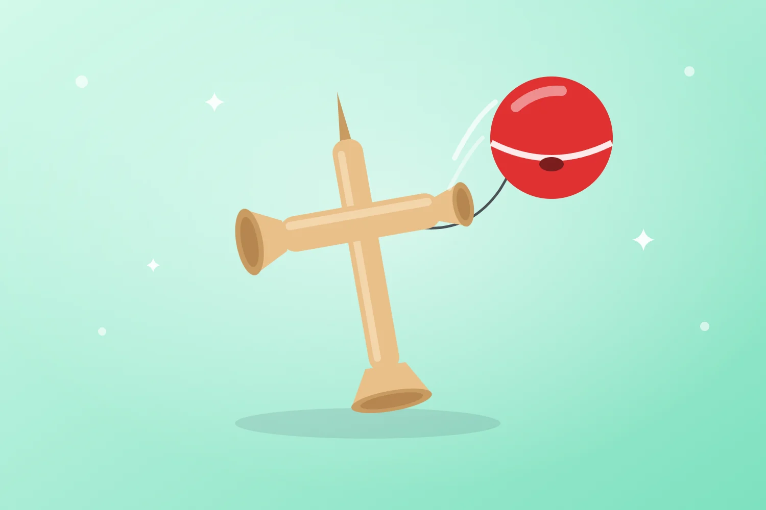 Drewniana kendama z czerwoną kulką na sznurku